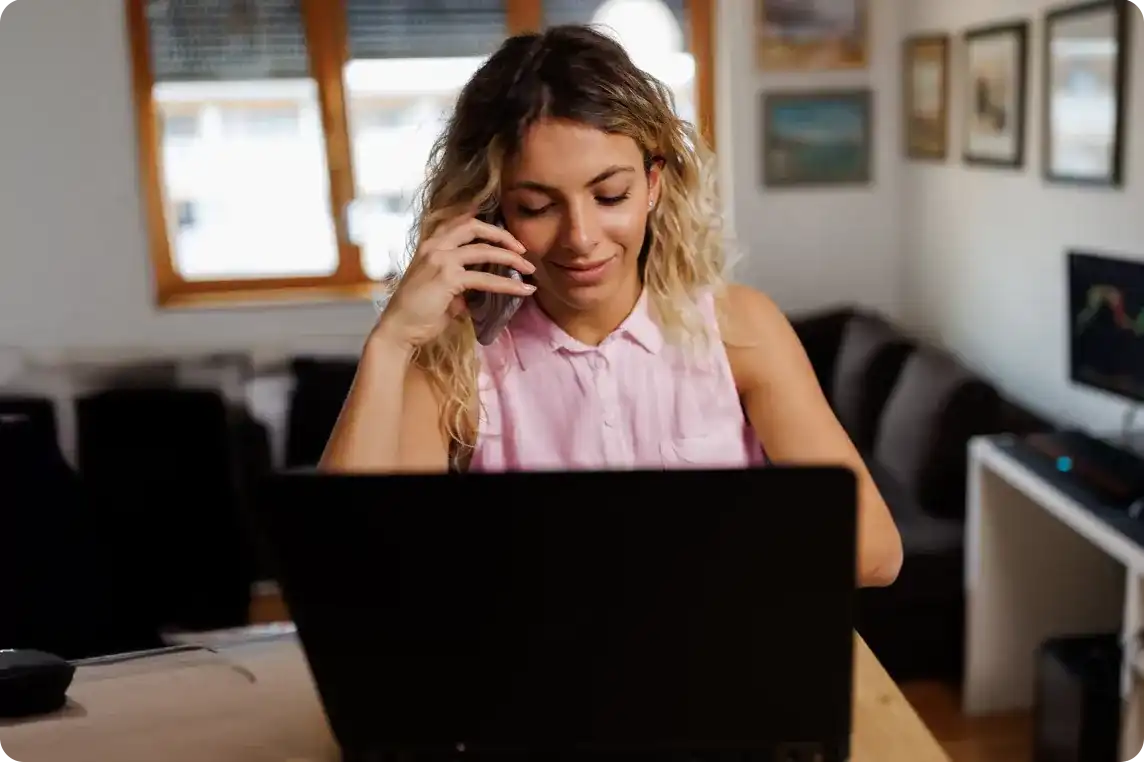 Using phone and laptop together.